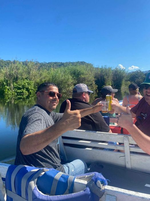 Guests cheering on a boat ride