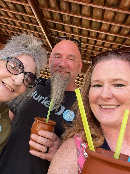 Friends taking a selfie with cantarito drinks